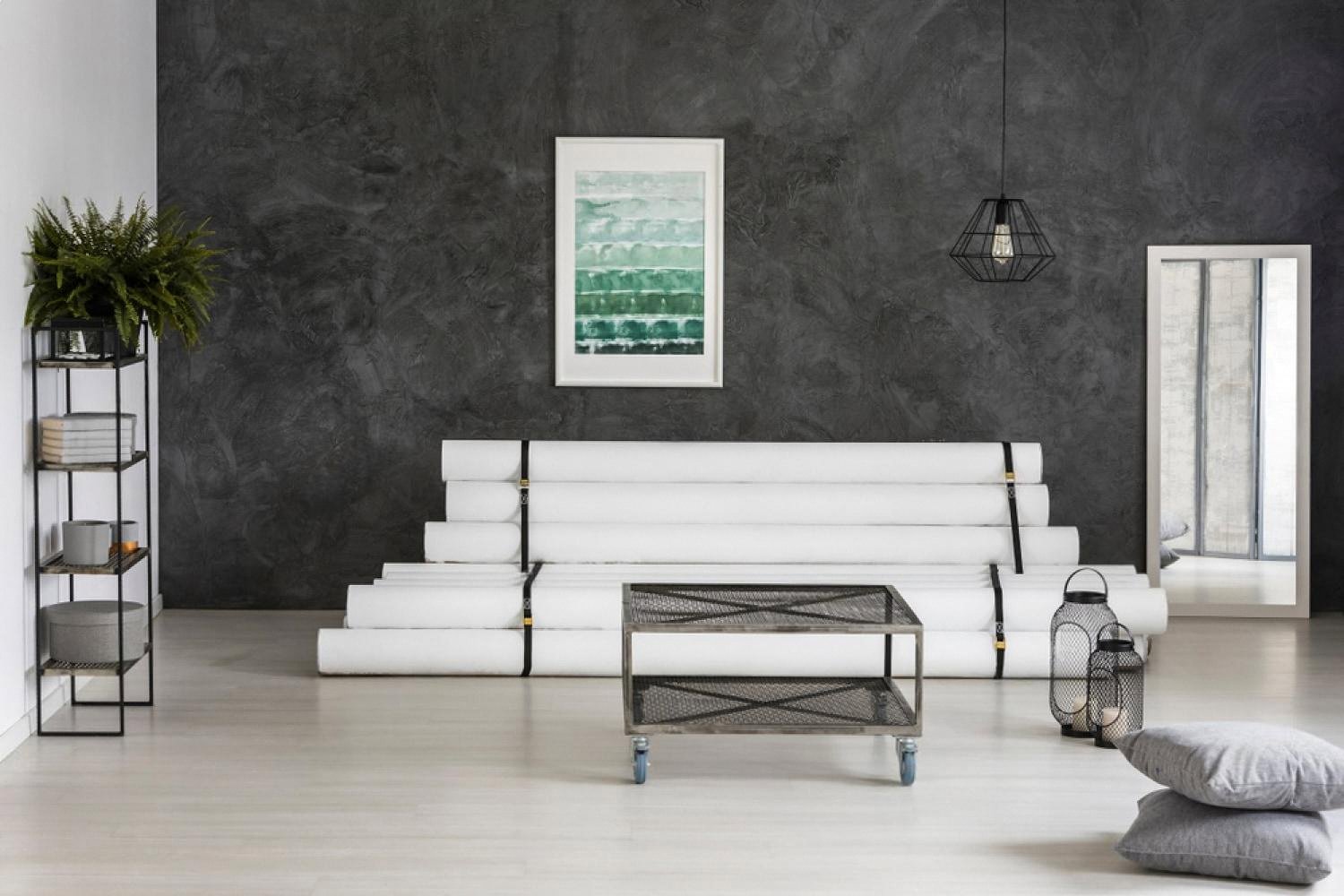 Modern UAE living space with dark accent wall and freestanding mirror concealing a hidden passage